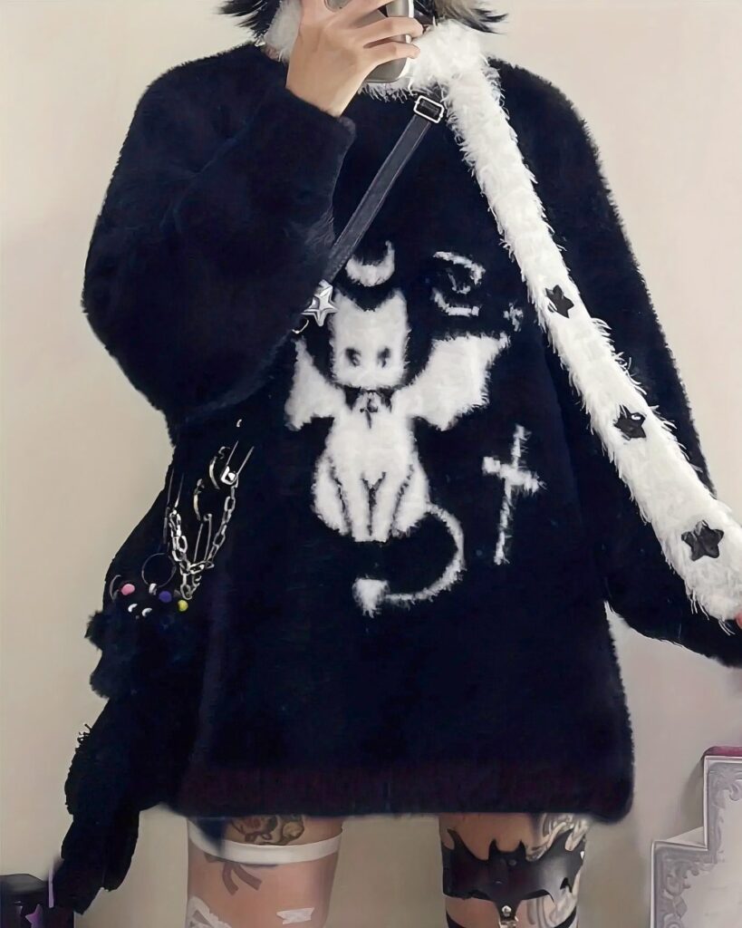Black kawaii neko sweater with goth punk aesthetic details, including a cat and star design.