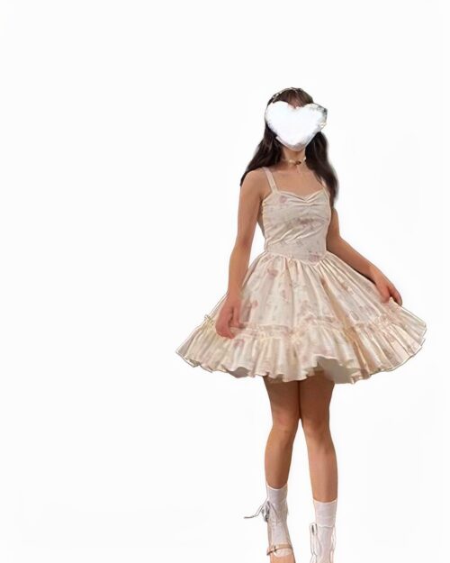 A light pink soft girl dress with floral pattern, featuring a tiered skirt and spaghetti straps.