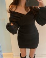 Black cross v-neck knitted dress in coquette aesthetic, featuring long sleeves and a flattering fit.