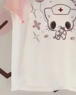 White neko nurse t-shirt with cute cartoon design featuring a nurse cat.