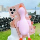 Pink duck iphone case showing a kawaii design with cloud details.