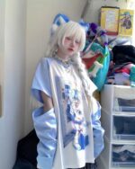 Saggy short-sleeved animecore aesthetic shirt featuring a Japanese manga print.