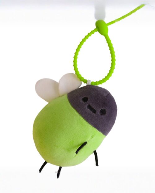 Cute firefly plush keychain hanging on a green loop.