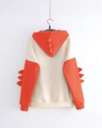Cute dinosaur hoodie featuring orange arm details and a dinosaur-shaped hood. A fun dinosaur hoodie.
