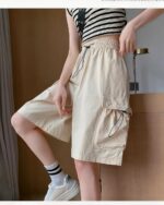 Casual loose shorts in a Korean aesthetic style, featuring pockets and a drawstring waist.