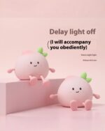 Two kawaii peach night lamps with smiling faces, perfect for a soft glow.