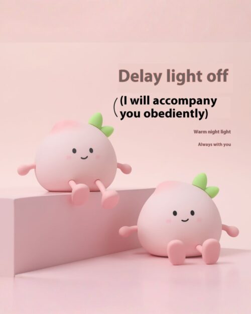 Two kawaii peach night lamps with smiling faces, perfect for a soft glow.