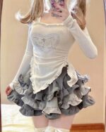 Y2k lolita set featuring a long-sleeved, heart-embroidered top and a layered ruffled skirt.