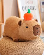 Cute brown capybara plushie with a carrot head, soft and cuddly.