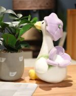 Kawaii Molly the Little Flower duck plushie toy, a white duck with a purple flower adornment.