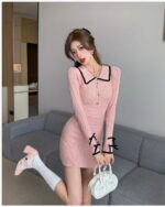 Pink Korean knitted dress with a vintage collar detail and button accents.