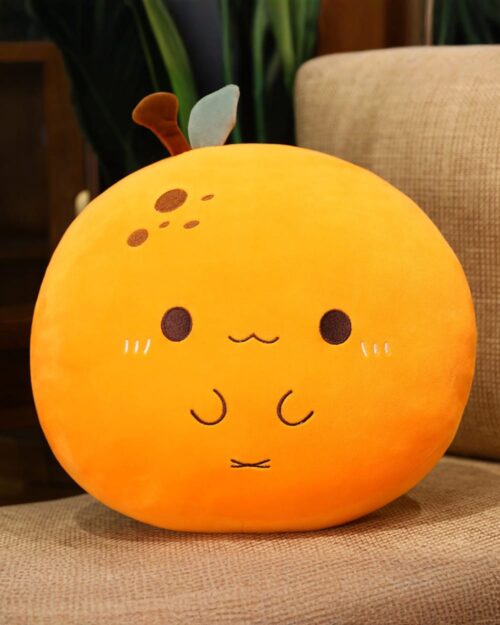 Kawaii fruit plushie cushion, an orange peach-shaped plush toy with facial details.