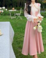 Long Pink Dress - Vintage Aesthetic, featuring a ruffled blouse and flowing skirt.