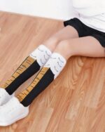 Kawaii chicken legs socks, depicting socks with chicken leg design on legs.