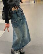 Long denim skirt with pockets, Y2K aesthetic, long skirt style.