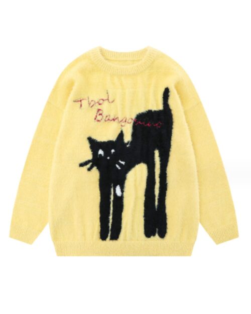 Yellow cat embroidered sweater with stretched cat design and text.