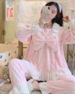 Pink kawaii flannel pajamas set with lace details and fluffy slippers.