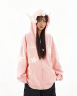 Pink harajuku hoodie with fluffy star appliqués and a hood. Casual street style fashion.