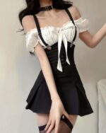 Black and white korean aesthetic set featuring a corset dress with suspenders and thigh-high stockings.