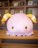 Rainbow Medusa the Pastel Jellyfish plushie, a cute pink and gold stuffed animal.