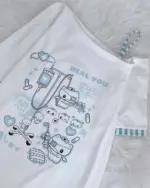 Blue nurse cat shirt with medical icons and text, cutecore aesthetic design.