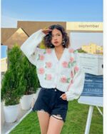 White vintage aesthetic cardigan with floral embroidery, long-sleeved knitwear.