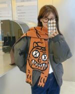Cartoon animal scarf featuring a smiling tiger design, a cute animal winter scarf.