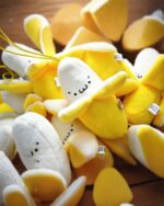 Several kawaii chibi banana plushies, a chibi banana plushie, are displayed together.