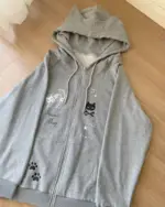 Gray cat paw print hoodie featuring embroidered cats and stars. Kawaii cat paw hoodie.