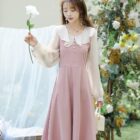 Pink puff sleeve french aesthetic dress with long sleeves and ruffles.