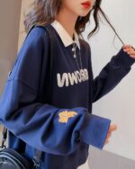 Blue korean aesthetic sweatshirt featuring a cute bear embroidery and a collar.