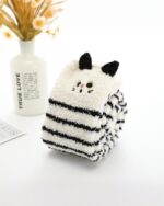 Kawaii fluffy socks featuring a cat design with stripes and ears.
