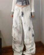 Washed-out y2k artsy pants with baggy fit and pockets.