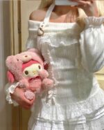 White himekaji aesthetic sweater with off-shoulder design and lace details, featuring a plush toy.