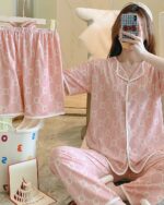 Pink floral Korean aesthetic pajamas set with button-down details. Comfortable summer homewear.