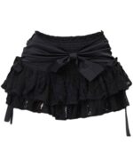 Black ruffled french style bow skirt with tie, Y2K aesthetic.