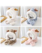 Four Cute and Fluffy Reindeer Winter Hats in various colors displayed on a wooden stand.