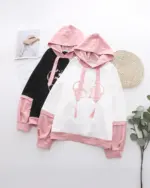 Sakura bunny hoodie featuring a layered design with cute bunny illustrations in pink and white.