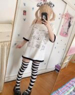 White harajuku kawaii t-shirt with cute character prints, striped socks, and accessories.