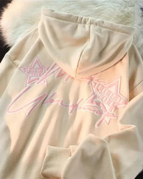 Harajuku streetwear hoodie with pink and blue star graphic print on the back.