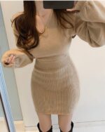 Tan cross v-neck knitted dress, a coquette aesthetic dress featuring a fitted design and long sleeves.