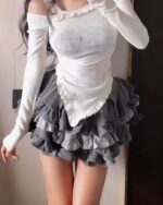 Y2k lolita set featuring a white ribbed top and layered gray ruffled skirt.