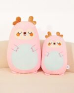 Kawaii bean-shaped wild animal plushies, featuring deer-themed plushies in pink and green.