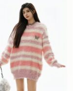 Striped fluffy sweater in a Korean aesthetic, featuring a pink and white color scheme.