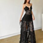 Black gothic aesthetic dress featuring lace, a cutout, and a sheer design.