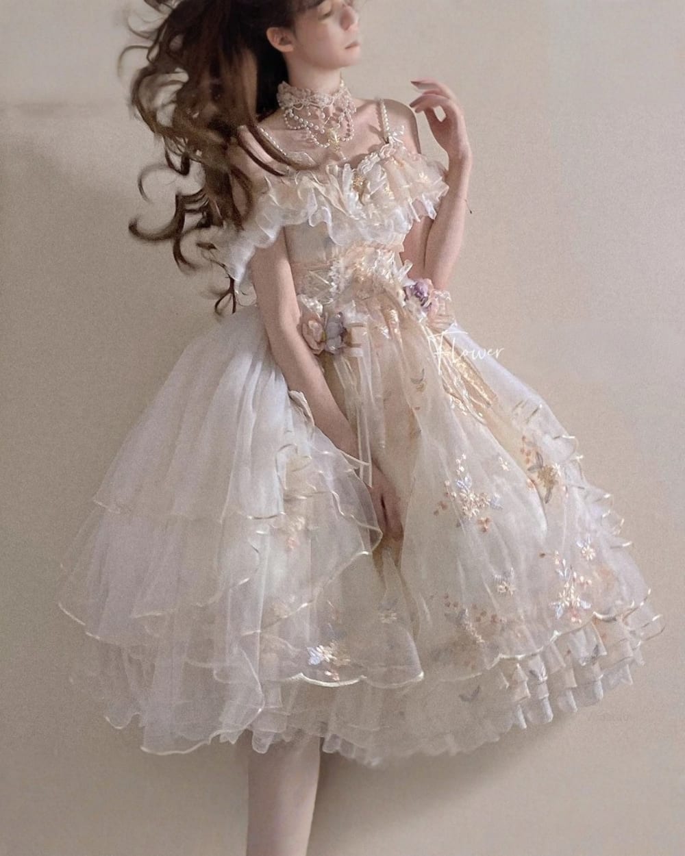 Detailed floral lolita dress with ruffles and lace, featuring a princesscore design.