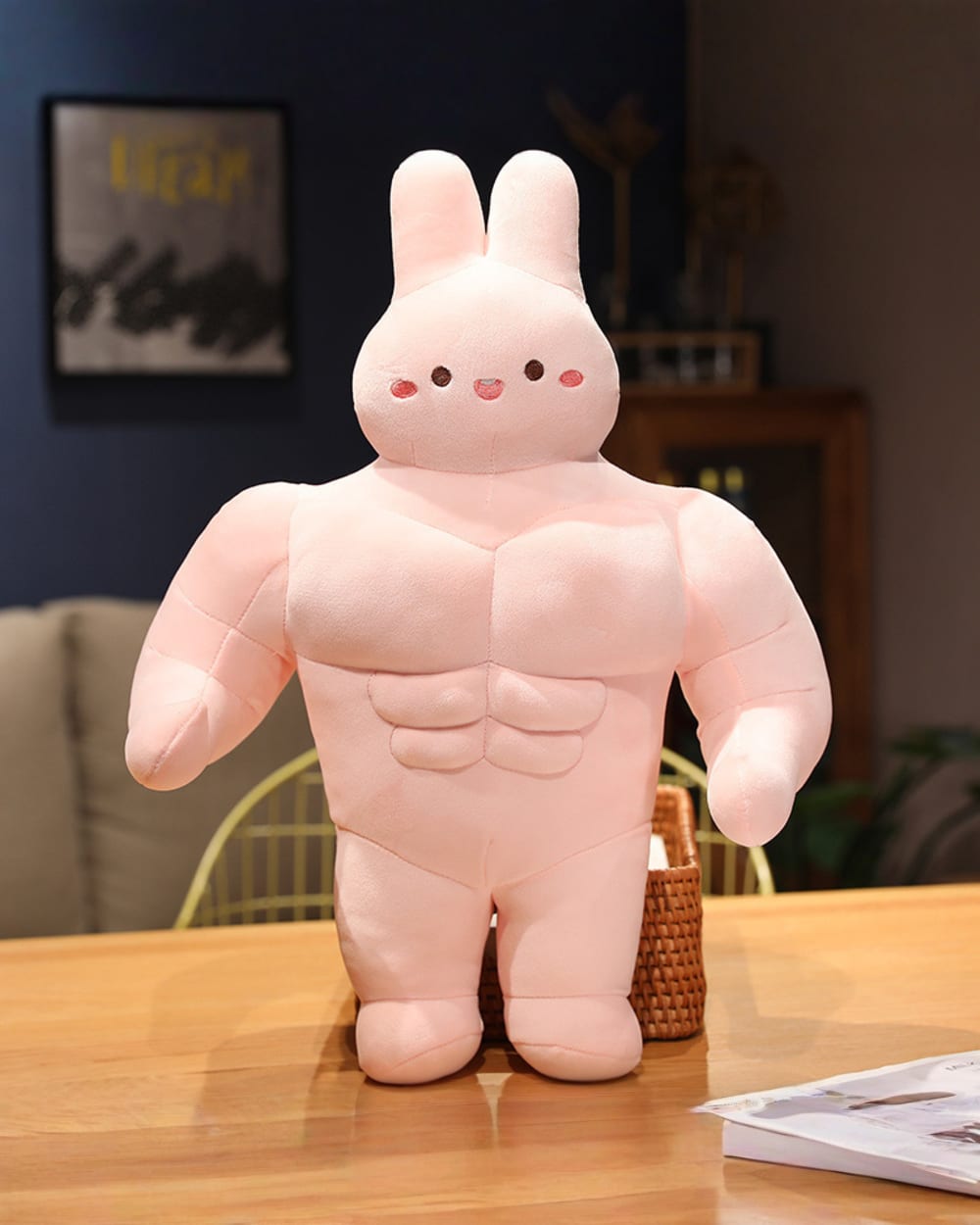 Pink buff bunny plushie with prominent muscle details.