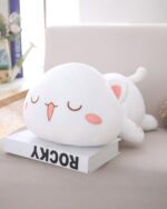 Kawaii Mochi Peach Cat Plushie, a soft and cute stuffed animal.