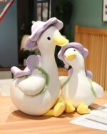 Kawaii Molly the Little Flower duck plushie toy, a cute white duck with a purple hat and flower details.