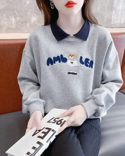 Grey korean aesthetic sweatshirt with cute bear embroidery and a blue collar.